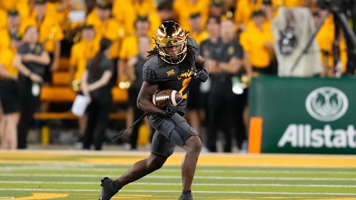 Aug 29, 2025; Waco, Texas, USA; Baylor Bears wide receiver Kole Wilson (2) runs after against Auburn Tigers during the first half at McLane Stadium. Mandatory Credit: Chris Jones-Imagn Images