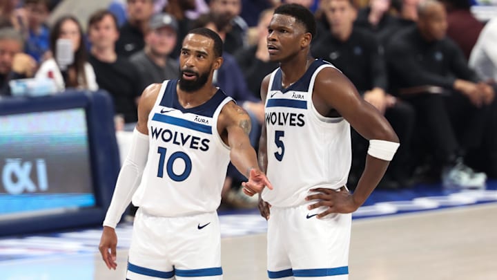 May 28, 2024; Dallas, Texas, USA; Minnesota Timberwolves guard Anthony Edwards (5) and guard Mike Conley (10) speak during the second quarter against the Dallas Mavericks in game four of the western conference finals for the 2024 NBA playoffs at American Airlines Center. Mandatory Credit: Kevin Jairaj-Imagn Images