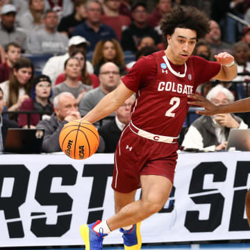 Mar 22, 2024; Memphis, TN, USA; Colgate Raiders guard Braeden Smith (2) dribbles against Baylor Bears guard Ja'Kobe Walter (4) during the second half of the NCAA Tournament First Round at FedExForum. Mandatory Credit: Petre Thomas-USA TODAY Sports