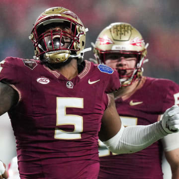 Dec 2, 2023; Charlotte, NC, USA; Florida State Seminoles defensive lineman Jared Verse (5) reacts during the fourth quarter against the Louisville Cardinals at Bank of America Stadium. Mandatory Credit: Jim Dedmon-USA TODAY Sports