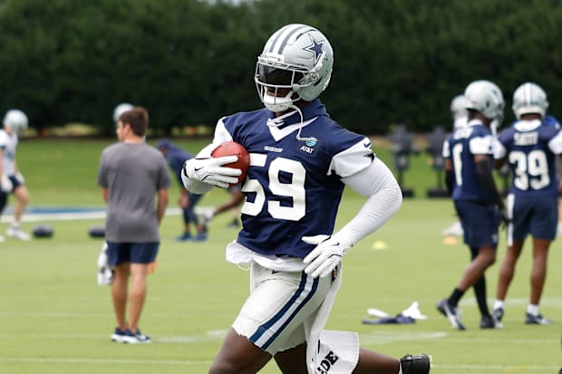 Dallas Cowboys linebacker Kenneth Murray Jr. goes through a drill during practice at the Ford Center at the Star
