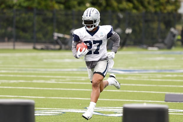 Dallas Cowboys running back Miles Sanders goes through a drill during practice at the Ford Center at the Star Training Facili