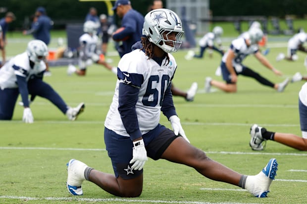 Dallas Cowboys offensive tackle Tyler Guyton goes through a drill during practice at the Ford Center at the Star 