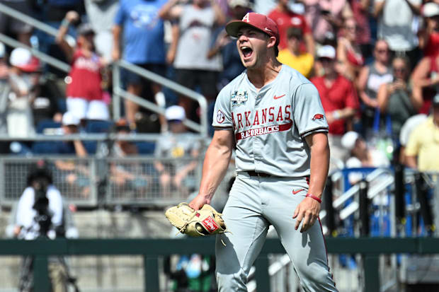 Arkansas Razorbacks starting pitcher Gage Wood (14) celebrates completing a no hitter against the Murray State Racers.