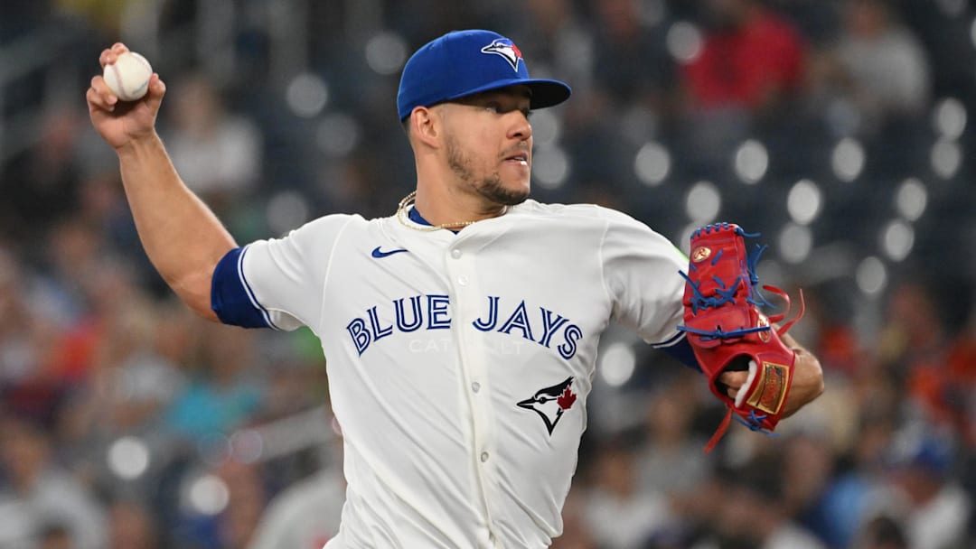 Jun 4, 2025; Toronto, Ontario, CAN; Toronto Blue Jays starting pitcher José Berríos (17) delivers a pitch against the Philadelphia Phillies in the first inning at Rogers Centre