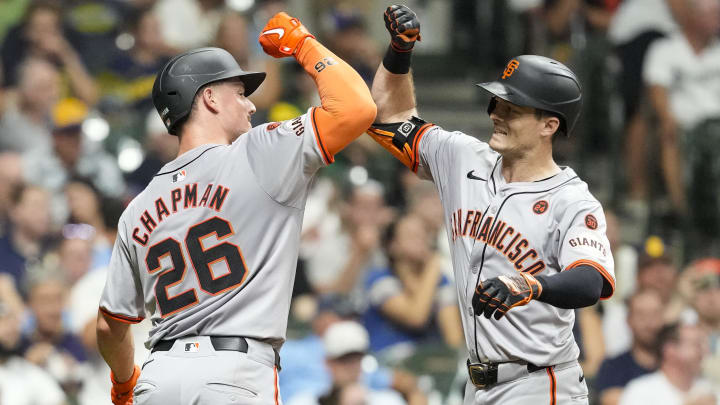 Aug 27, 2024; Milwaukee, Wisconsin, USA;  San Francisco Giants right fielder Mike Yastrzemski (5) celebrates with third baseman Matt Chapman (26) after hitter a home run during the seventh inning against the Milwaukee Brewers at American Family Field.