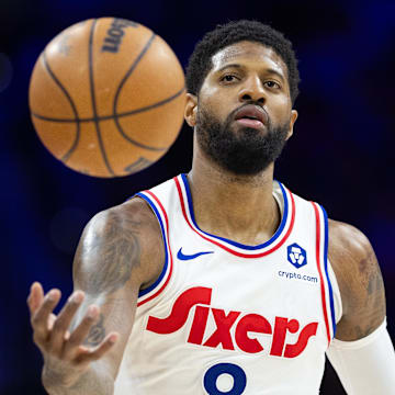 Mar 1, 2025; Philadelphia, Pennsylvania, USA; Philadelphia 76ers forward Paul George (8) catches a ball against the Golden State Warriors during the third quarter at Wells Fargo Center. Mandatory Credit: Bill Streicher-Imagn Images