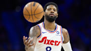 Mar 1, 2025; Philadelphia, Pennsylvania, USA; Philadelphia 76ers forward Paul George (8) catches a ball against the Golden State Warriors during the third quarter at Wells Fargo Center. Mandatory Credit: Bill Streicher-Imagn Images