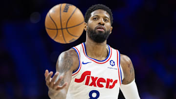 Mar 1, 2025; Philadelphia, Pennsylvania, USA; Philadelphia 76ers forward Paul George (8) catches a ball against the Golden State Warriors during the third quarter at Wells Fargo Center. Mandatory Credit: Bill Streicher-Imagn Images