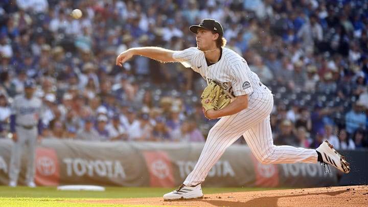 Jun 25, 2025; Denver, Colorado, USA; Colorado Rockies pitcher Chase Dollander (32) throws during the first inning against the Los Angeles Dodgers at Coors Field. Jun 25, 2025; Denver, Colorado, USA; Colorado Rockies pitcher Chase Dollander (32) throws during the first inning against the Los Angeles Dodgers at Coors Field.