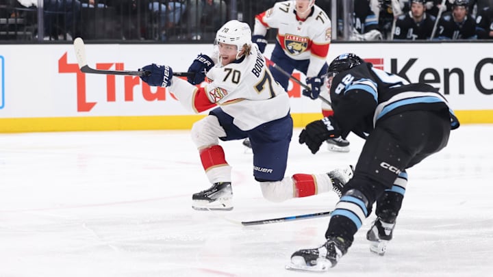 Jan 8, 2025; Salt Lake City, Utah, USA; Florida Panthers center Jesper Boqvist (70) shoots and scores a goal against the Utah Hockey Club during the third period at Delta Center. Mandatory Credit: Rob Gray-Imagn Images