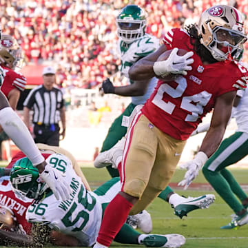 Sep 9, 2024; Santa Clara, California, USA; San Francisco 49ers running back Jordan Mason (24) runs during the second quarter against the New York Jets at Levi's Stadium. Mandatory Credit: David Gonzales-Imagn Images