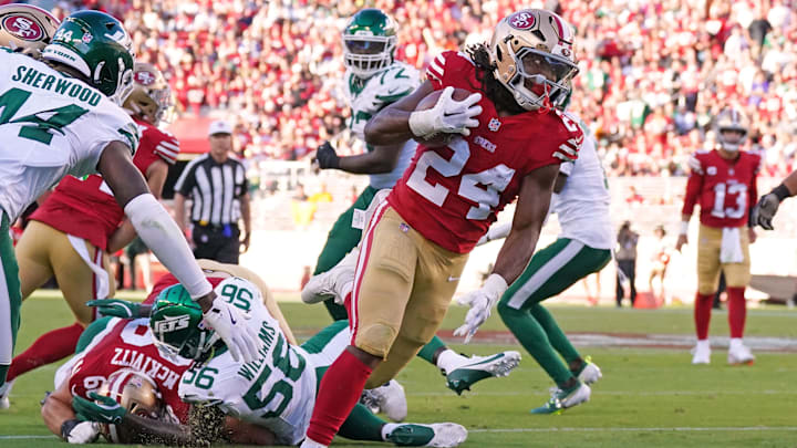 Sep 9, 2024; Santa Clara, California, USA; San Francisco 49ers running back Jordan Mason (24) runs during the second quarter against the New York Jets at Levi's Stadium. Mandatory Credit: David Gonzales-Imagn Images