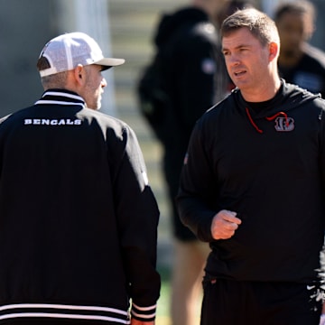 Bengals head coach Zac Taylor speaks to Bengals offensive coordinator Dan Pitcher during the Bengals Rookie Mini Camp on Friday, May 9, 2025 at Paycor Stadium in Cincinnati.