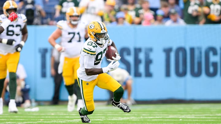 Green Bay Packers wide receiver Romeo Doubs (87) makes a catch and runs the ball against the Tennessee Titans during the first half at Nissan Stadium. Green Bay Packers wide receiver Romeo Doubs (87) makes a catch and runs the ball against the Tennessee Titans during the first half at Nissan Stadium.