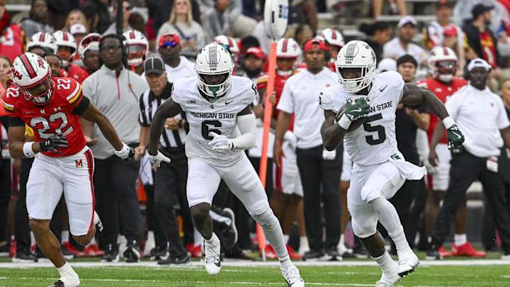 Sep 7, 2024; College Park, Maryland, USA; Michigan State Spartans running back Nate Carter (5) runs with the ball during the first half against the Maryland Terrapins at SECU Stadium. Mandatory Credit: Tommy Gilligan-Imagn Images