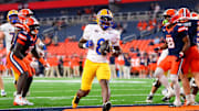 Oct 18, 2025; Syracuse, New York, USA; Pittsburgh Panthers running back Juelz Goff (8) runs into the end zone for a touchdown against the Syracuse Orange during the second half at the JMA Wireless Dome. Mandatory Credit: Rich Barnes-Imagn Images