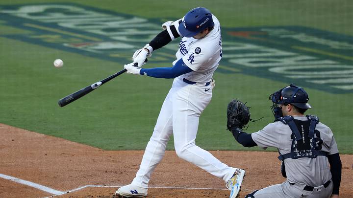 Oct 26, 2024; Los Angeles, California, USA; Los Angeles Dodgers designated hitter Shohei Ohtani (17) hits a fly ball against the New York Yankees in the first inning for game two of the 2024 MLB World Series at Dodger Stadium. Mandatory Credit: Kiyoshi Mio-Imagn Images