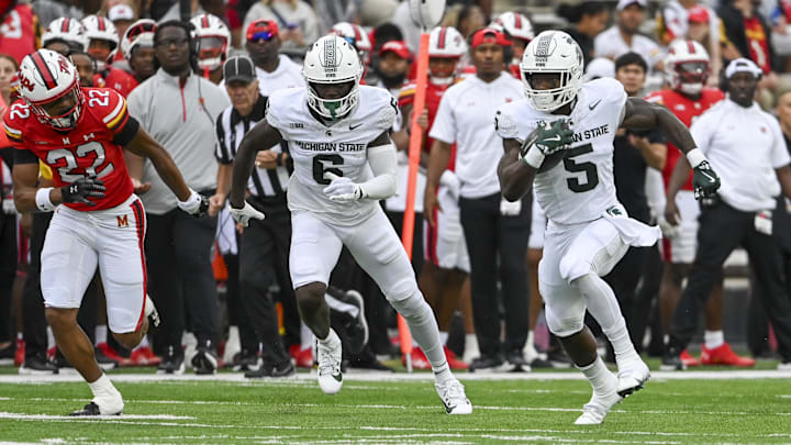 Sep 7, 2024; College Park, Maryland, USA; Michigan State Spartans running back Nate Carter (5) runs with the ball during the first half against the Maryland Terrapins at SECU Stadium. Mandatory Credit: Tommy Gilligan-Imagn Images