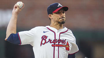 Sep 4, 2024; Cumberland, Georgia, USA; Atlanta Braves pitcher Charlie Morton (50) pitches against the Colorado Rockies during the first inning at Truist Park. Mandatory Credit: Dale Zanine-Imagn Images
