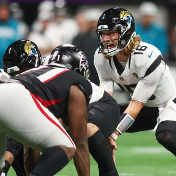 Aug 23, 2024; Atlanta, Georgia, USA; Jacksonville Jaguars quarterback Trevor Lawrence (16) at the line of scrimmage against the Atlanta Falcons in the second quarter at Mercedes-Benz Stadium. Mandatory Credit: Brett Davis-USA TODAY Sports