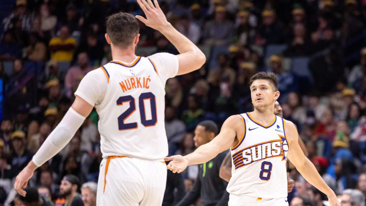 Jan 19, 2024; New Orleans, Louisiana, USA;  Phoenix Suns guard Grayson Allen (8) slaps hands with