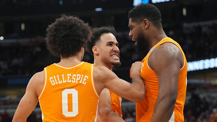 Tennessee guards Ja'Kobi Gillespie (0) and Ethan Burg (35) celebrates with forward Jaylen Carey (23) after he scored on Iowa State in the NCAA Tournament Sweet 16 at the United Center in Chicago on March 27, 2026.