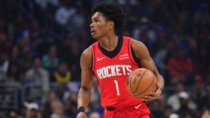 Apr 14, 2024; Los Angeles, California, USA; Houston Rockets forward Amen Thompson (1) controls the ball against the Los Angeles Clippers during the first half at Crypto.com Arena. Mandatory Credit: Gary A. Vasquez-USA TODAY Sports