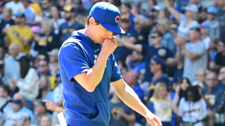 Jun 30, 2024; Milwaukee, Wisconsin, USA; Chicago Cubs manager Craig Counsell walks back to the dugout after making a pitching change in the fourth inning against the Milwaukee Brewers at American Family Field.