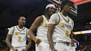 Nov. 8, 2024; Columbia, Missouri, USA; Missouri guards Tamar Bates, Marcus Allen and Anthony Robinson celebrate Robinson's dunk against Howard.