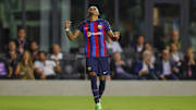 Jul 19, 2022; Miami, FL, USA; FC Barcelona forward Raphinha celebrates after scoring during the first half against Inter Miami CF at DRV PNK Stadium. Mandatory Credit: Sam Navarro-Imagn Images