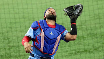 May 28, 2025; Arlington, Texas, USA; Toronto Blue Jays catcher Ali Sanchez (20) makes a catch during the eighth inningagainst the Texas Rangers at Globe Life Field. Mandatory Credit: Kevin Jairaj-Imagn Images
