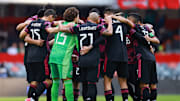 Jugadores de México previo a un partido ante Costa Rica.