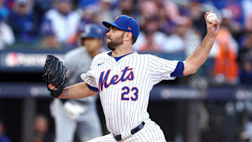 Oct 18, 2024; New York City, New York, USA; New York Mets starting pitcher David Peterson (23) delivers a pitch during the first inning against the Los Angeles Dodgers during game five of the NLCS for the 2024 MLB playoffs at Citi Field. Mandatory Credit: Vincent Carchietta-Imagn Images