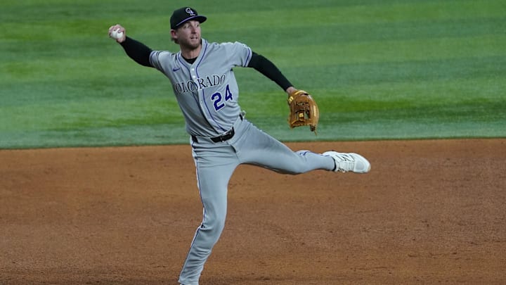May 13, 2025; Arlington, Texas, USA; Colorado Rockies third baseman Ryan McMahon (24) throws to first base during the fifth inning against the Texas Rangers at Globe Life Field. Mandatory Credit: Raymond Carlin III-Imagn Images May 13, 2025; Arlington, Texas, USA; Colorado Rockies third baseman Ryan McMahon (24) throws to first base during the fifth inning against the Texas Rangers at Globe Life Field. Mandatory Credit: Raymond Carlin III-Imagn Images