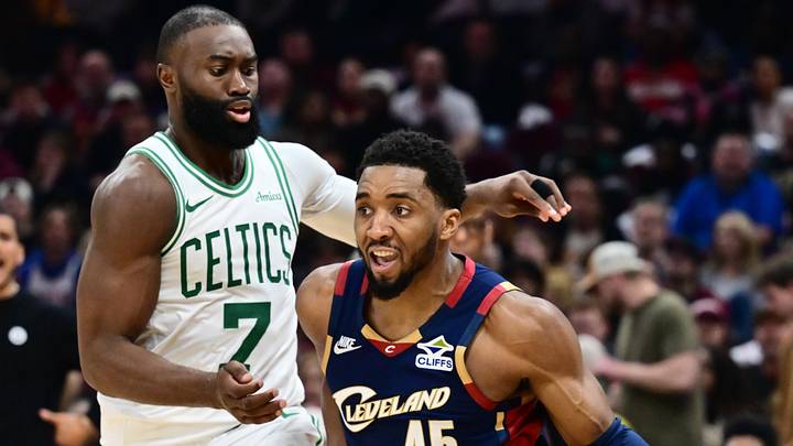 Mar 8, 2026; Cleveland, Ohio, USA; Cleveland Cavaliers guard Donovan Mitchell (45) drives to the basket against Boston Celtics guard Jaylen Brown (7) during the second half at Rocket Arena. Mandatory Credit: Ken Blaze-Imagn Images