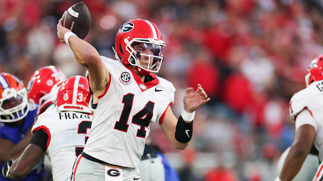 Nov 1, 2025; Jacksonville, Florida, USA; Georgia Bulldogs quarterback Gunner Stockton (14) looks to pass in the second half against the Florida Gators at EverBank Stadium. Mandatory Credit: Matt Pendleton-Imagn Images