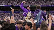 UW fans celebrate the 2023 victory over Oregon. 