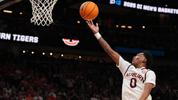 Mar 30, 2025; Atlanta, GA, USA; Auburn Tigers guard Tahaad Pettiford (0) drives during the second half in the South Regional final of the 2025 NCAA tournament against the Michigan State Spartans at State Farm Arena. Mandatory Credit: Dale Zanine-Imagn Images
