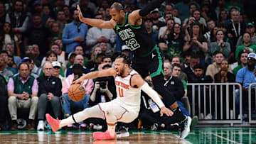 May 14, 2025; Boston, Massachusetts, USA; Boston Celtics center Al Horford (42) is called for a foul on New York Knicks guard Jalen Brunson (11) in the second half during game five of the second round for the 2025 NBA Playoffs at TD Garden. Mandatory Credit: Bob DeChiara-Imagn Images