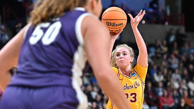 USC Trojans guard Avery Howell (23) shoots the ball against the Kansas State Wildcats during the second half of a game.
