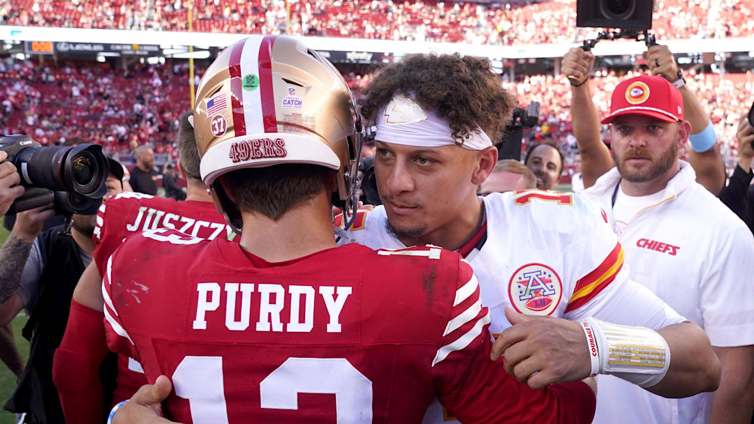 Kansas City Chiefs quarterback Patrick Mahomes (15) meets with San Francisco 49ers quarterback Brock Purdy (13)