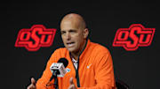 Oct 23, 2024; Kansas City, MO, USA; Oklahoma State Cowboys head coach Steve Lutz talks to media during the Big 12 Men’s Basketball Media Day at T-Mobile Center. Mandatory Credit: Jay Biggerstaff-Imagn Images