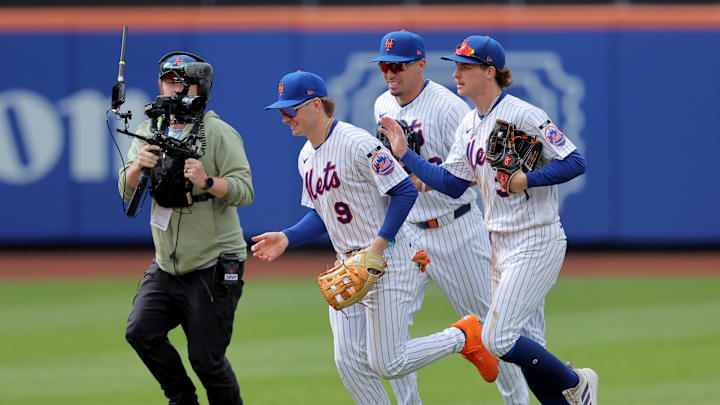 May 14, 2026; New York City, New York, USA; New York Mets right fielder Carson Benge (3) pats center fielder A.J. Ewing (9) on the back as they celebrate after defeating the Detroit Tigers at Citi Field. Mandatory Credit: Brad Penner-Imagn Images