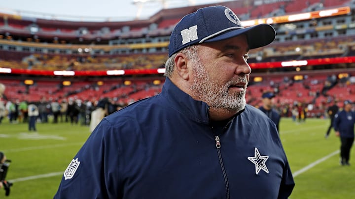 Dallas Cowboys head coach Mike McCarthy leaves the field after the game against the Washington Commanders.
