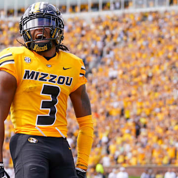 Sep 14, 2024; Columbia, Missouri, USA; Missouri Tigers wide receiver Luther Burden III (3) celebrates after scoring a touchdown against the Boston College Eagles during the first half at Faurot Field at Memorial Stadium.