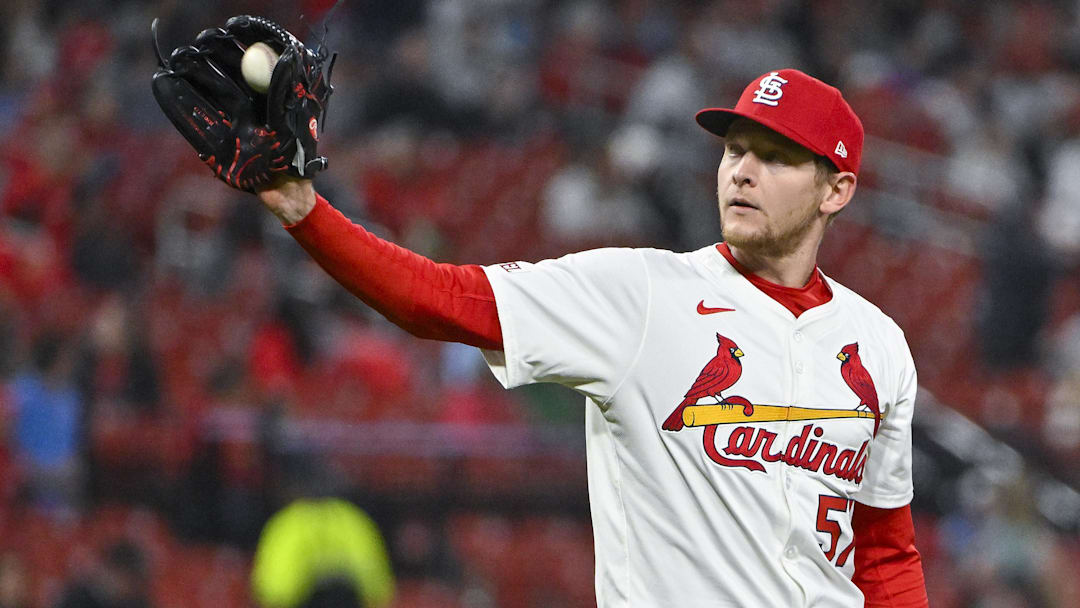 Apr 23, 2024; St. Louis, Missouri, USA;  St. Louis Cardinals relief pitcher Zack Thompson (57) receives a new ball after giving up a two run home run to Arizona Diamondbacks shortstop Kevin Newman (not pictured) during the fifth inning at Busch Stadium. Mandatory Credit: Jeff Curry-Imagn Images