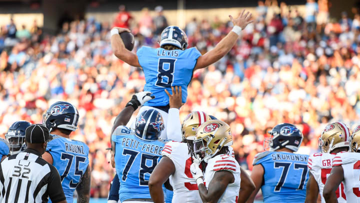 Aug 10, 2024; Nashville, Tennessee, USA; Tennessee Titans Will Levis (8) celebrates his touchdown against the San Francisco 49ers during the first half at Nissan Stadium