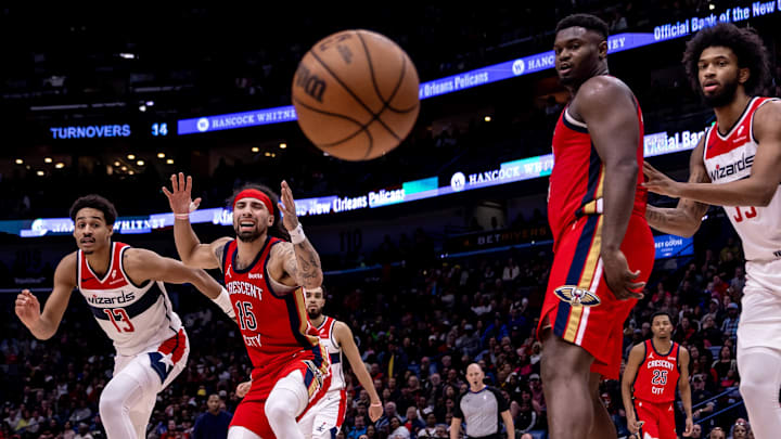 Feb 14, 2024; New Orleans, Louisiana, USA; Washington Wizards guard Jordan Poole (13) knocks the ball away from New Orleans Pelicans guard Jose Alvarado (15) out of bounds during the second half at Smoothie King Center. Mandatory Credit: Stephen Lew-Imagn Images Feb 14, 2024; New Orleans, Louisiana, USA; Washington Wizards guard Jordan Poole (13) knocks the ball away from New Orleans Pelicans guard Jose Alvarado (15) out of bounds during the second half at Smoothie King Center. Mandatory Credit: Stephen Lew-Imagn Images