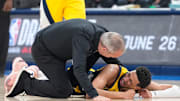 Jun 22, 2025; Oklahoma City, Oklahoma, USA; Indiana Pacers guard Tyrese Haliburton (0) reacts after suffering an injury during the first quarter against the Oklahoma City Thunder during game seven of the 2025 NBA Finals at Paycom Center. Mandatory Credit: Kyle Terada-Imagn Images